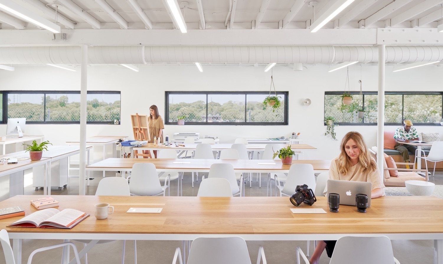 Workers in The Commune coworking studio in Austin, Texas have the right lighting for a variety of tasks, including high CRI lighting for artists