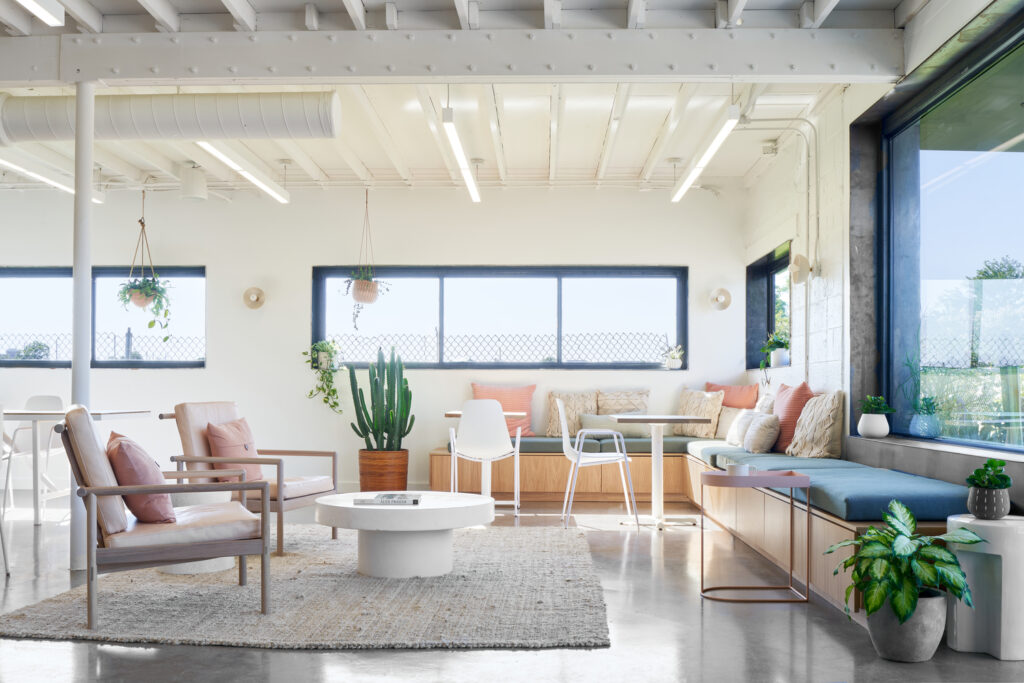 LED pendant lights in The Commune creative co-working space highlight some of the architectural trends of 2023, such as a "resimercial" design