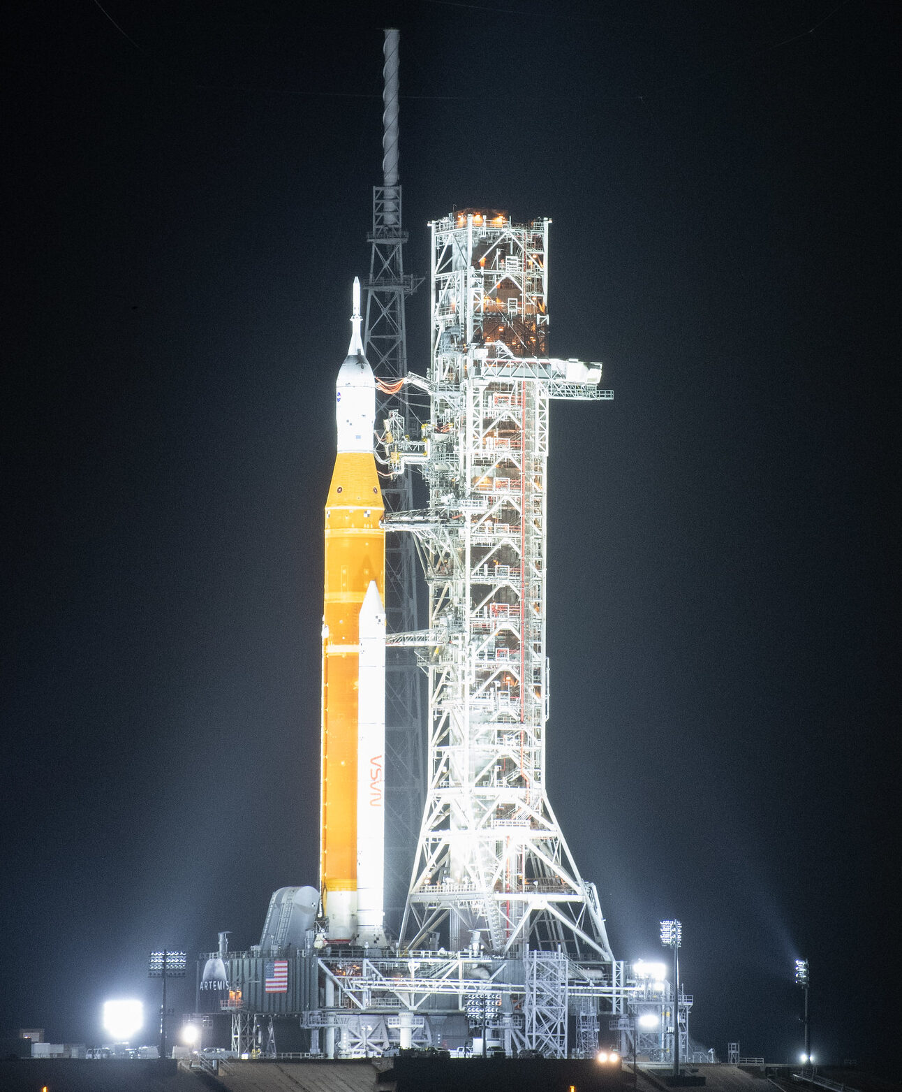 Specialized lighting that can withstand high temperatures and pressure lights up NASA's Artemis I spacecraft as it sits on the launchpad and prepares for launch 