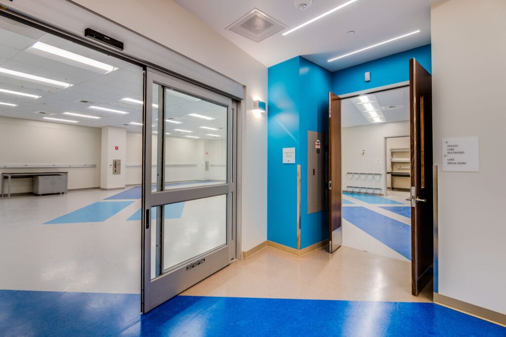 A new medical facility built with recessed lighting featuring center basket troffers to reduce glare.