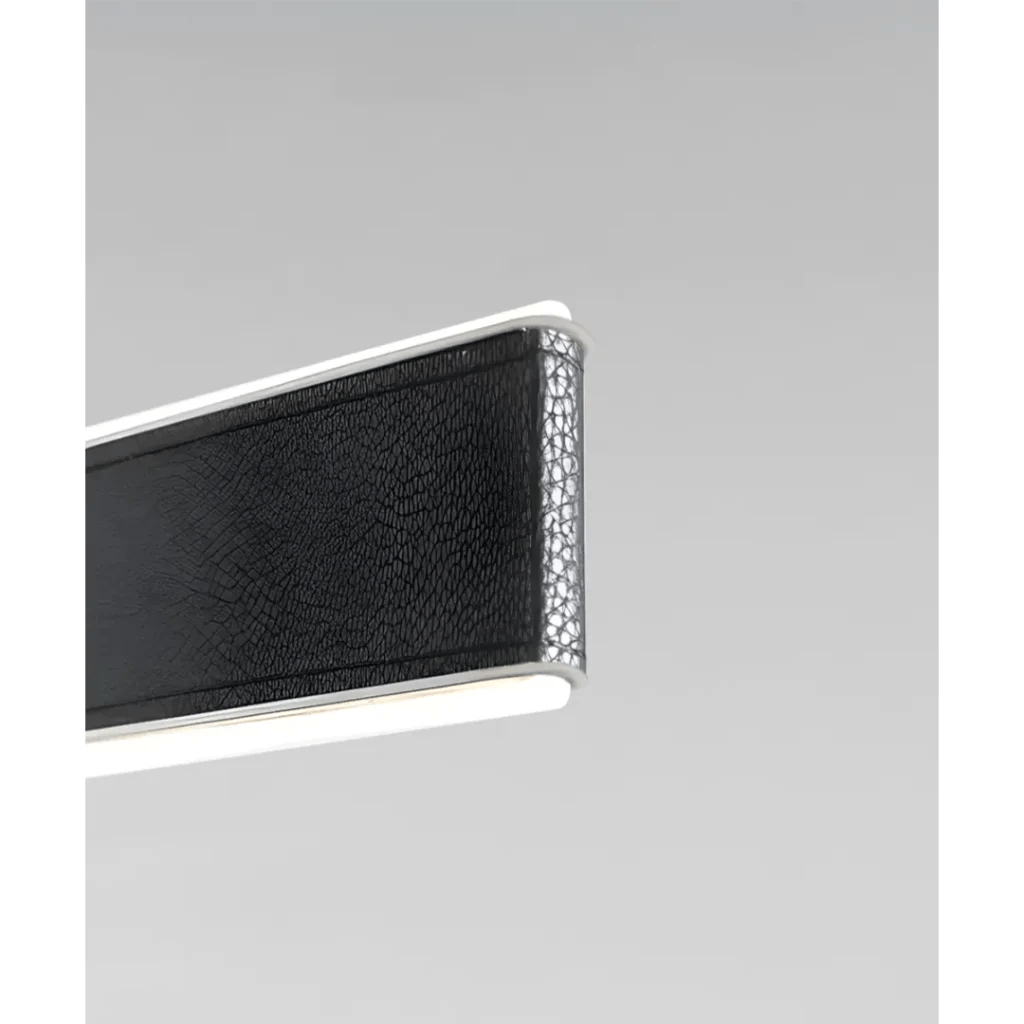 Product rendering of the 12249 suspending linear light shown with the black vegan leather wrap