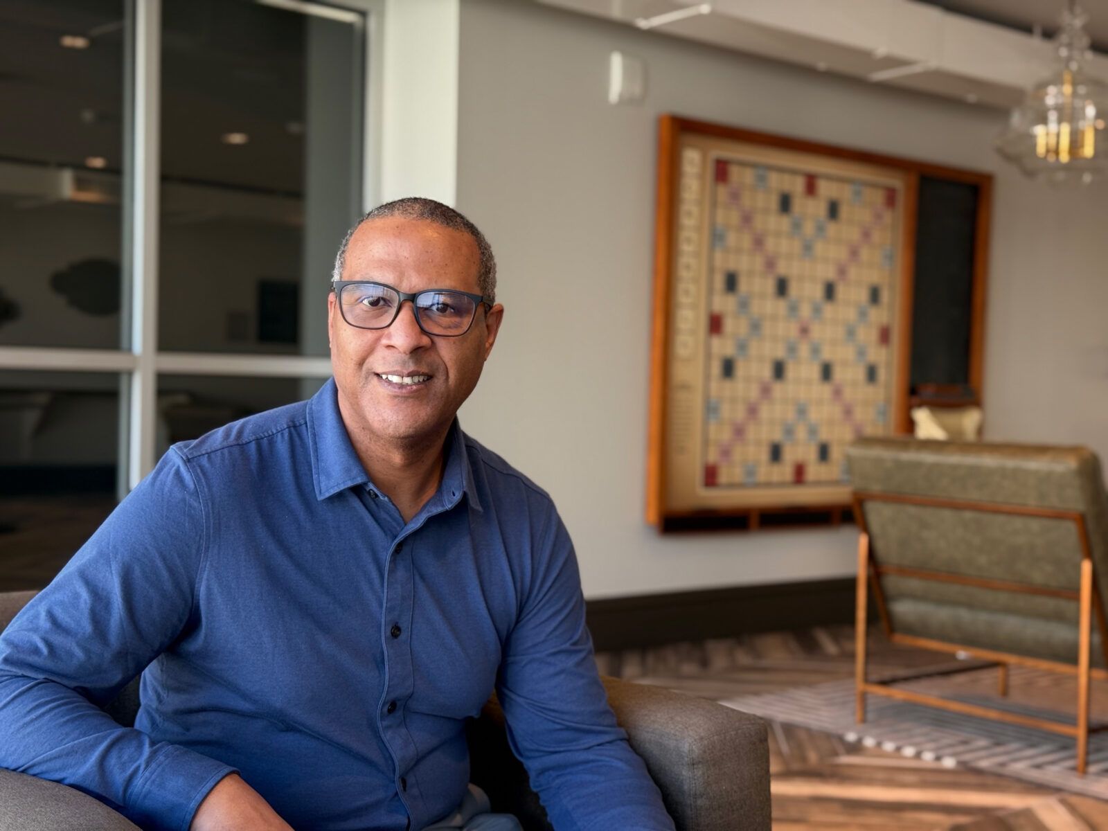 Alcon Lighting sales consultant sits in an office in Southern California