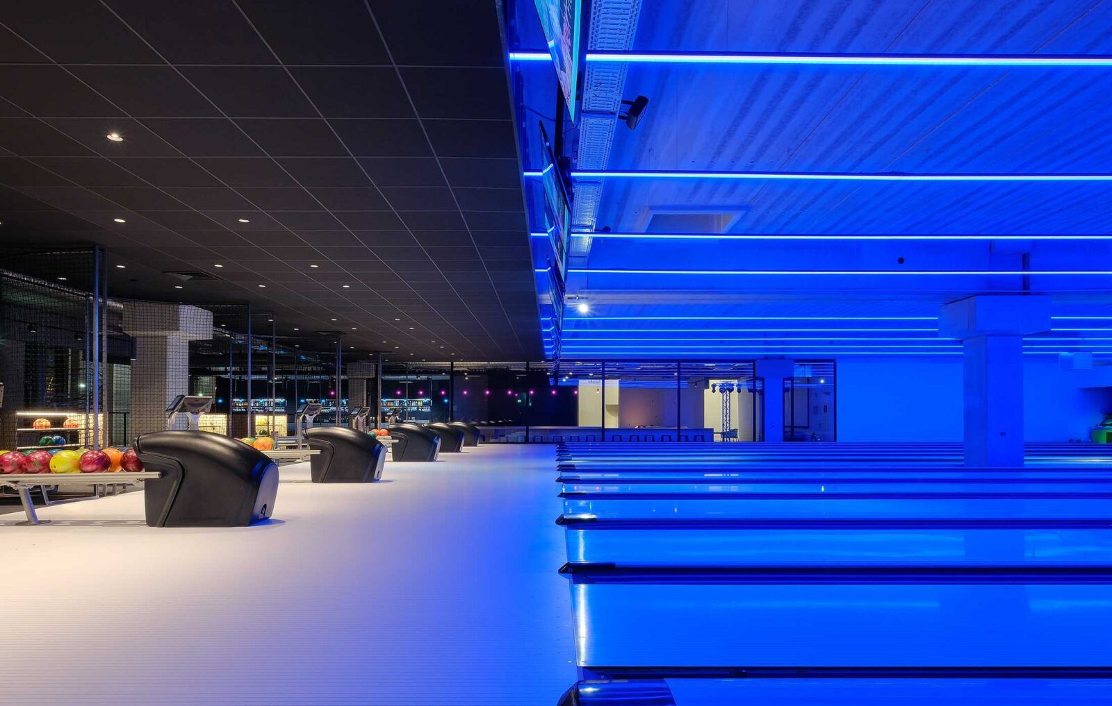 RGBW lights paired with DMX controls create vibrant scenes in a bowling alley