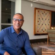 Alcon Lighting sales consultant sits in an office in Southern California