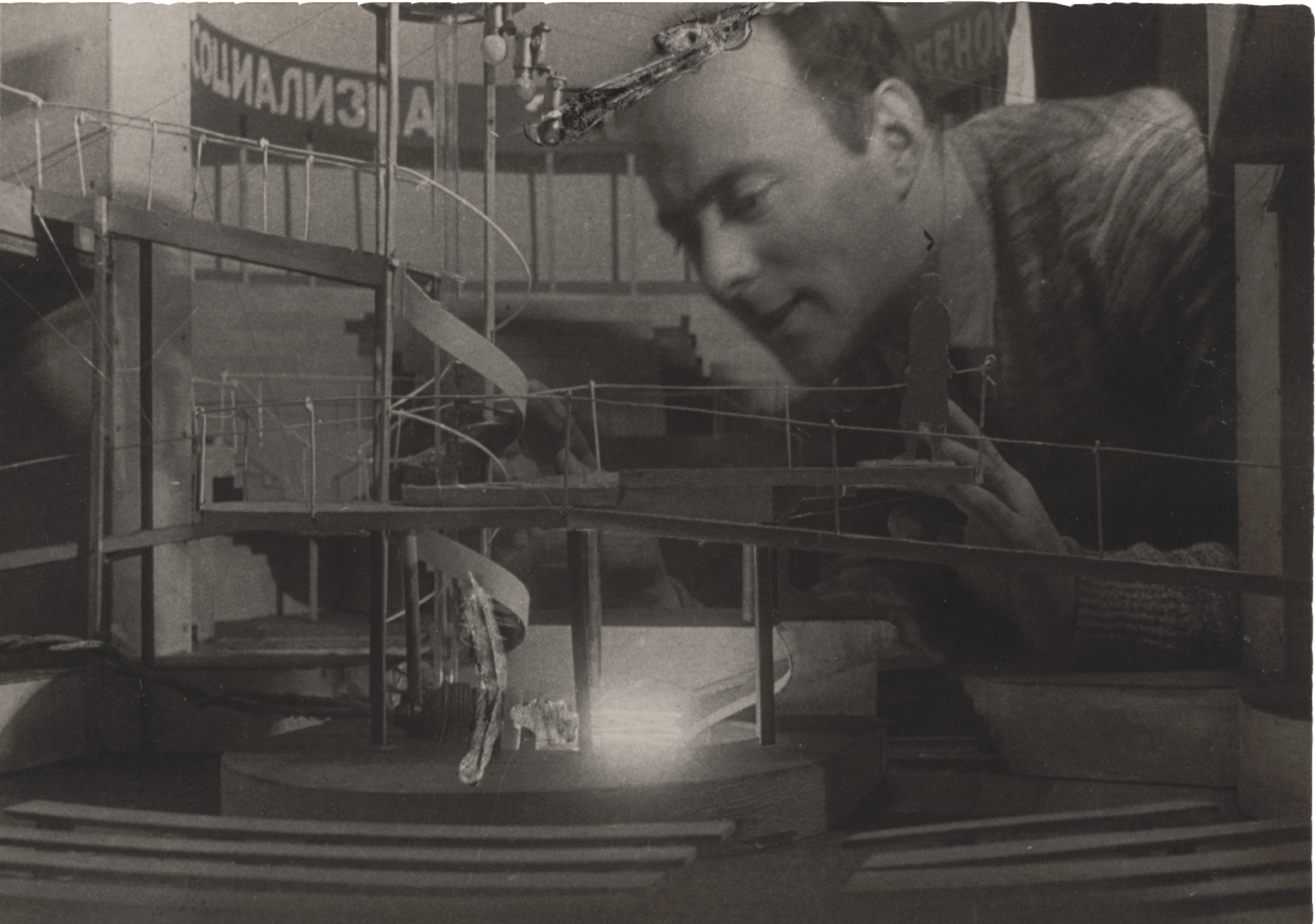 Russian artist El Lissitzky, shown here working on the set design for the play "I Want a Baby" and the Meyerhold Thearer, is said to be on of the first artists to utilize light in his works
