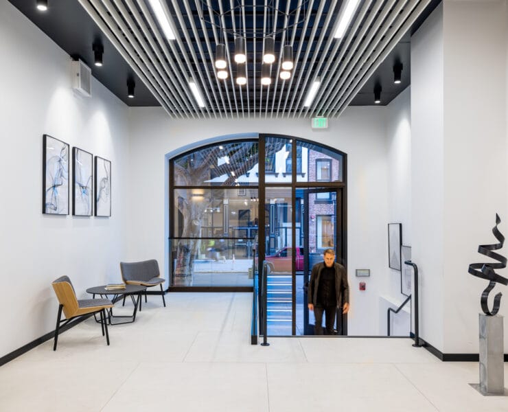 A lobby of a San Fransisco commercial lobby adheres to 2024 lighting regulations.