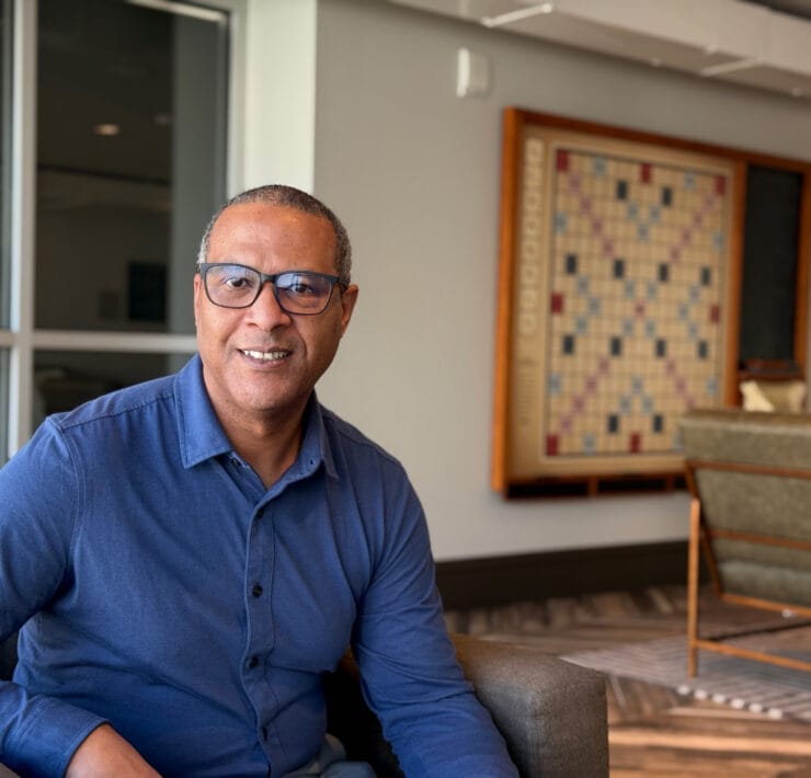 Alcon Lighting sales consultant sits in an office in Southern California