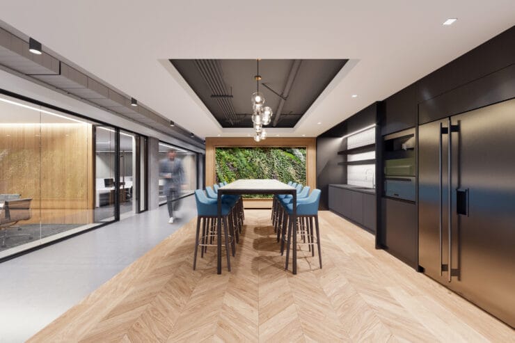 A break area in an office spec suite introduces natural materials and a green wall
