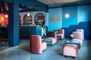 in the intro to lighting design, we explain how designers balance natural and electrical light, as seen in this cafe