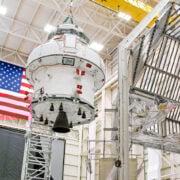 Engineers prepare the Artemis space capsule for thermal testing at NASA's Plum Brook Station