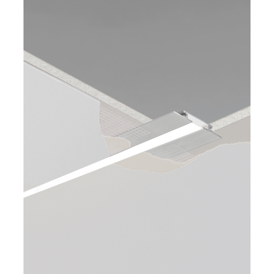 12100-10-R-LR recessed low-rise linear ceiling light by Alcon Lighting, shown in silver finish and with a flush trimless lens.