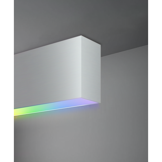 Alcon 12100-20-S, surface linear ceiling light shown in silver finish with a flush trim-less lens, and color changing capabilities.