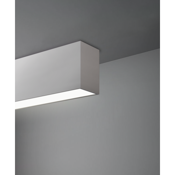 Alcon 12100-22-S, surface linear ceiling light shown in silver finish and with a flush trim-less lens.