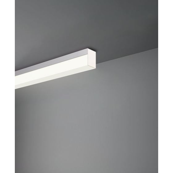 Alcon 12100-8-S, surface linear ceiling light shown in silver finish and with a flush trim-less lens.