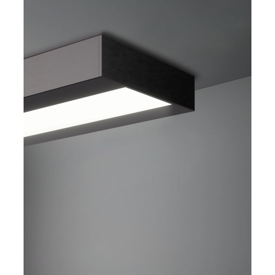 Alcon 12113-P, rectangular prism shaped suspended pendant light shown in satin black finish and with an inset, central flushed lens.