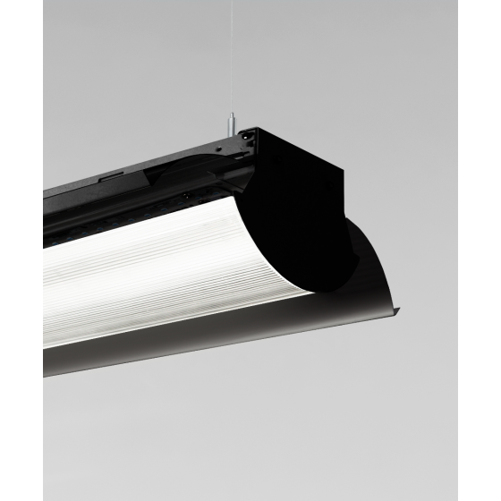 Alcon 12114-P, suspended linear pendant light shown in black finish with curved side directors, and a curved ribbed bottom lens.