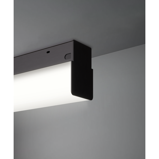 Alcon 12171-P, slim, rectangular bottomed, suspended pendant light shown in satin black finish and with a side wrapping flushed lens.