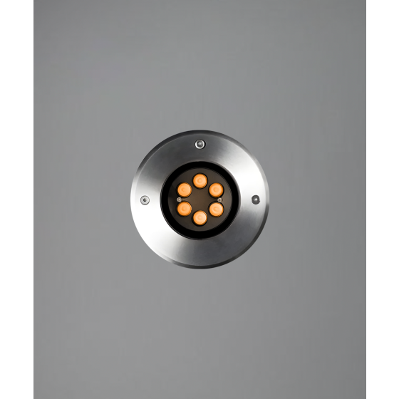 The 14127-6 in-ground well light by Alcon Lighting with a clear, 6-inch shatterproof lens shown with a stainless steel finish