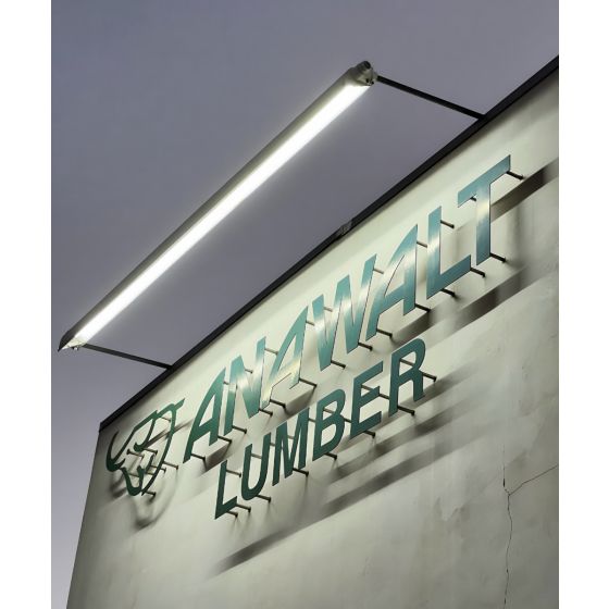 Application photo of the 31029 commercial LED sign light illuminating the Anawalt Lumber sign in California at night