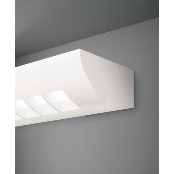 Alcon 6020, surface mount linear wall light shown in white finish and with a flush curved louvered lens.
