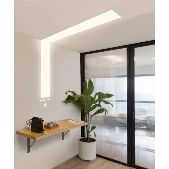 Alcon 12100-66-R-CW, recessed linear ceiling to wall light shown in white finish and with a flush trim-less lens.