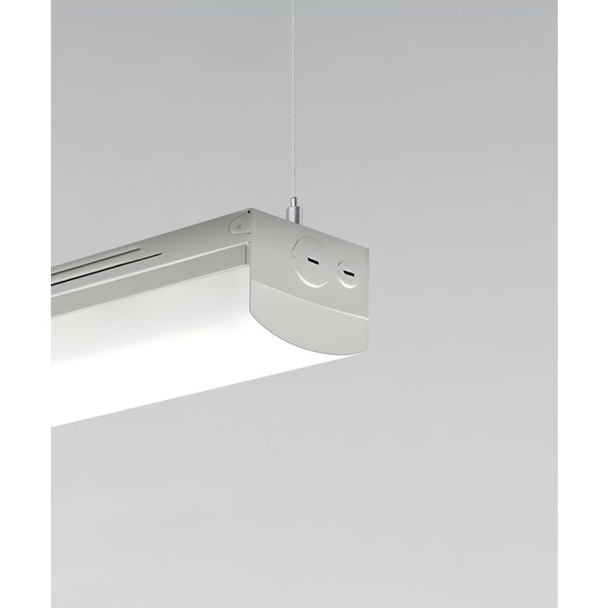 Alcon 11163-S, surface linear ceiling light shown in silver finish and with a wrapping ribbed lens.
