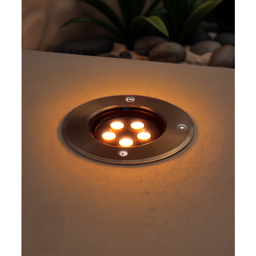 The 14127-6 in-ground well light by Alcon Lighting with a clear, 6-inch shatterproof lens shown with a stainless steel finish