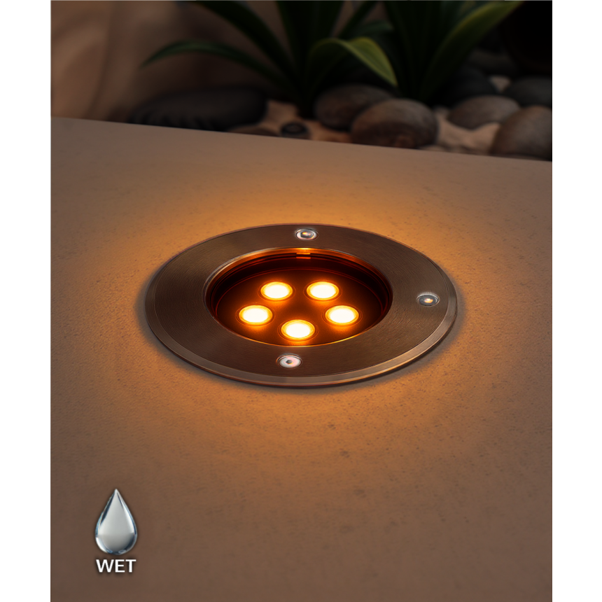The 14127-6 in-ground well light by Alcon Lighting with a clear, 6-inch shatterproof lens shown with a stainless steel finish