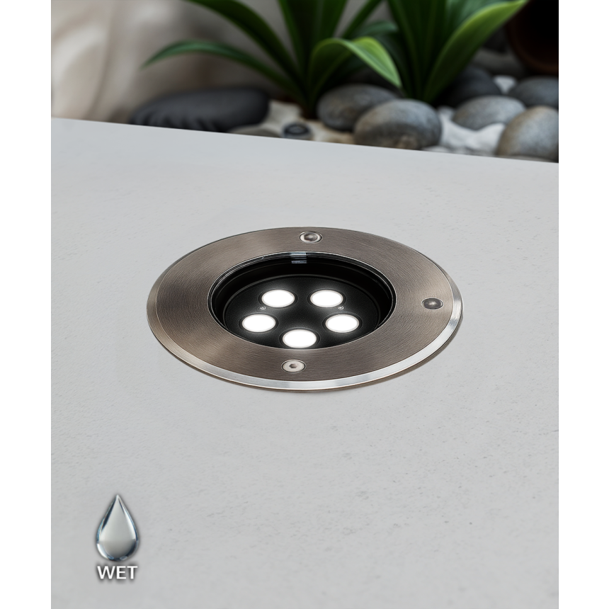 The 14127-6 in-ground well light by Alcon Lighting with a clear, 6-inch shatterproof lens shown with a stainless steel finish