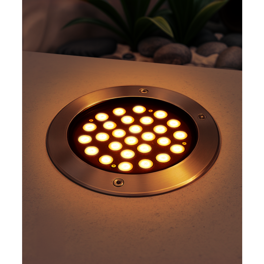 The 14127-9 in-ground well light by Alcon Lighting with a clear, 9-inch shatterproof lens shown with a stainless steel finish