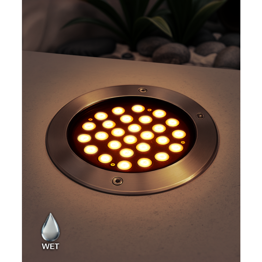 The 14127-9 in-ground well light by Alcon Lighting with a clear, 9-inch shatterproof lens shown with a stainless steel finish