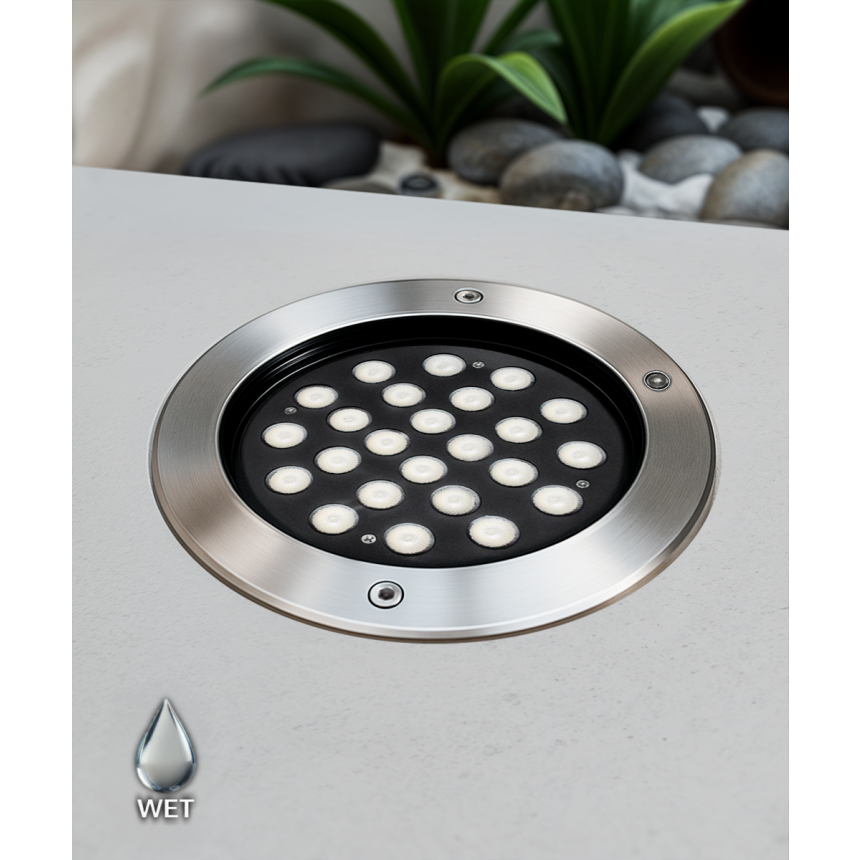 The 14127-9 in-ground well light by Alcon Lighting with a clear, 9-inch shatterproof lens shown with a stainless steel finish