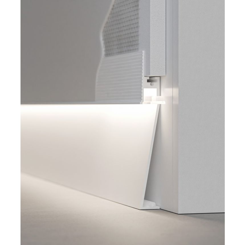 The 15244-A-RGBW recessed linear baseboard light shown in silver finish and with a flush trimless lens.