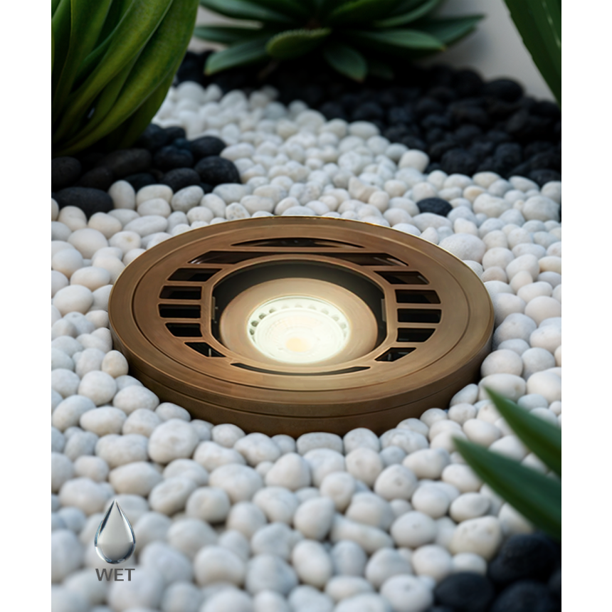 Alcon 9031 LED Well Light shown in a cast brass finish