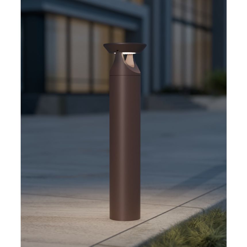 Alcon 9035-TRI 40-inch tri-arm commercial LED bollard light on exterior shown in a bronze finish.