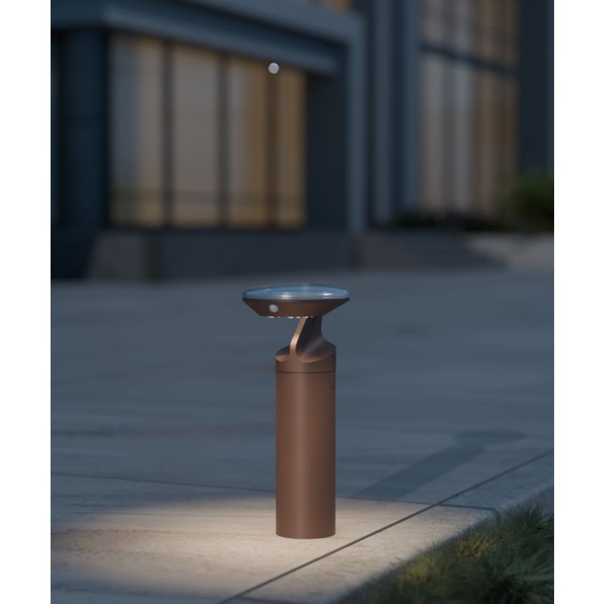 Alcon 9035-TRI 40-inch tri-arm commercial LED bollard light on exterior shown in a bronze finish.