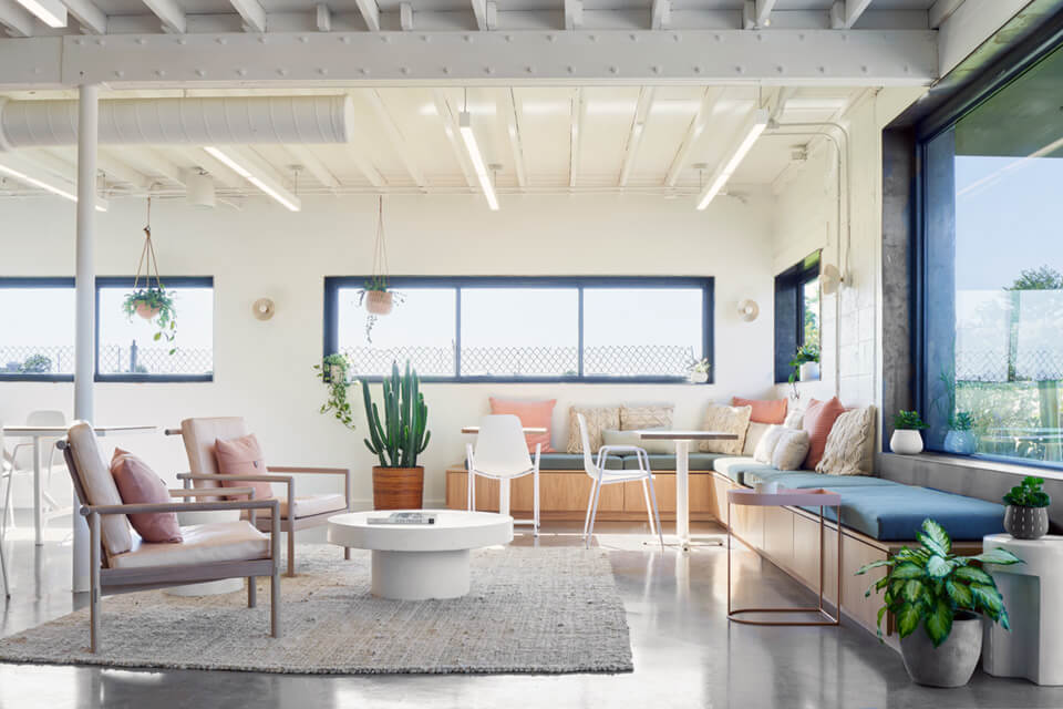 Suspended linear light fixtures provide high CRI at The Commune creative co-working space in Austin, Texas