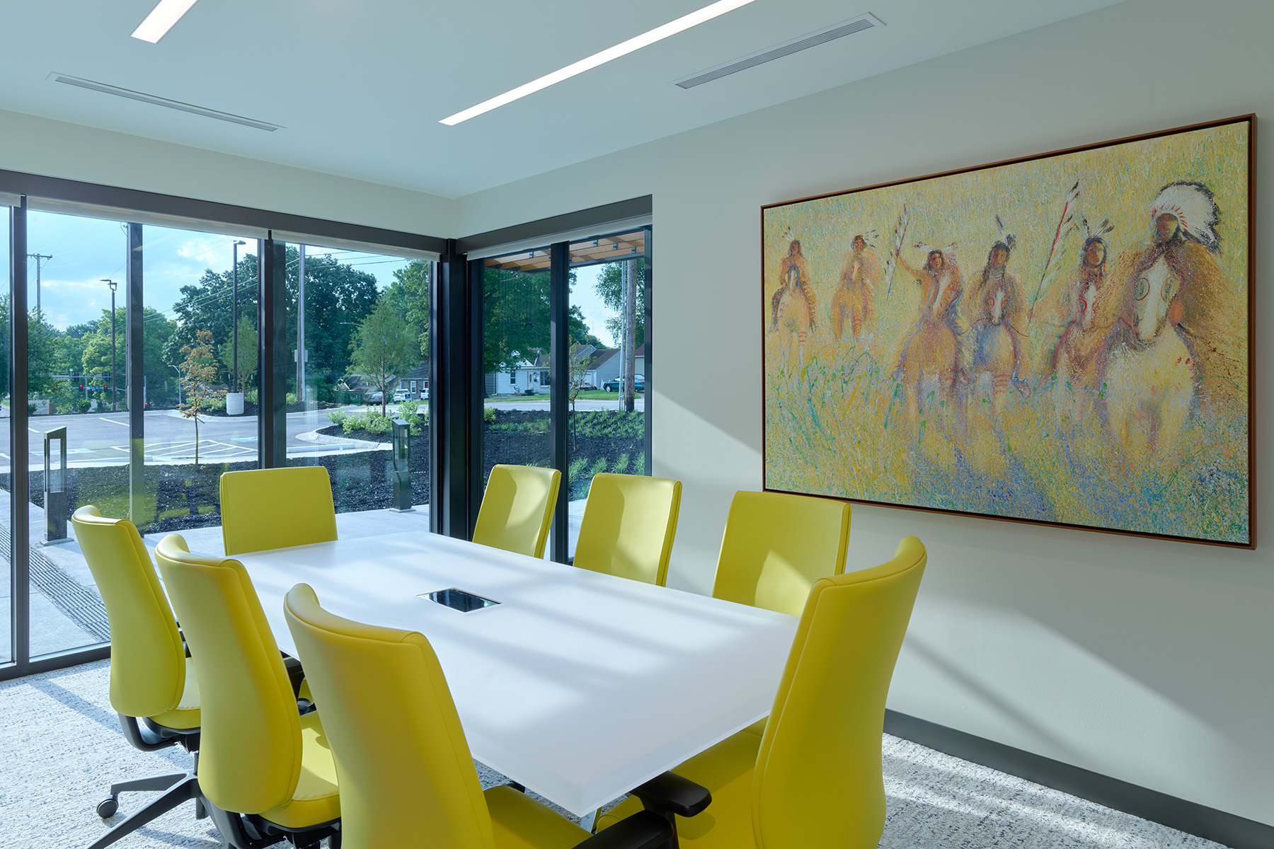 Conference rooms with linear recessed lights can be configured for training, meeting and mock-trial scenarios.